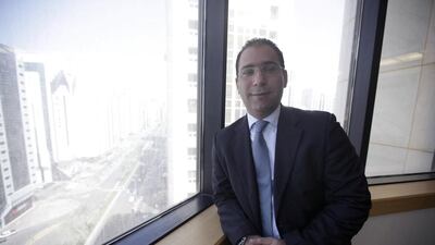 Nabil Al Rantisi has been making more money selling selling sandwiches than stocks. Sammy Dallal / The National