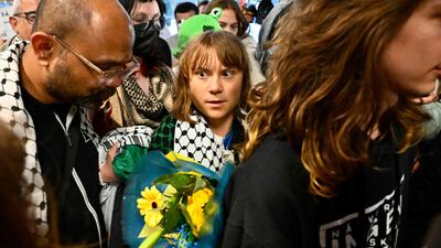 Climate and political activist Greta Thunberg is greeted on arrival at Stockholm-Arlanda Airport in her homeland of Sweden after being deported by Israel. AFP
