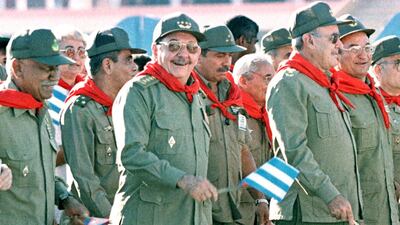 As Cuban Armed Forces Minister, Raul Castro joins protesters as they march past the US Interests Section in Havana, July 26, 2000. President Fidel Castro, Raul's brother, led the group of Cubans as they commemorated a 1953 battle in which Castro-led revolutionaries fought against then-dictator Fulgencio Batista. RP/HB