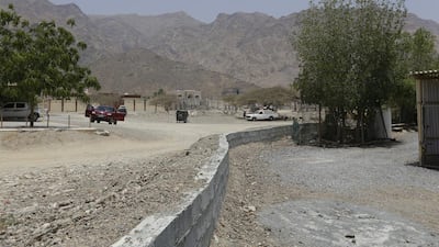 Dust is a health hazard to children and elders in the village. Jeffrey E Biteng / The National