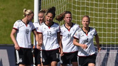 Celia Sasi, centre, celebrates with teammates after scoring during Germany's victory Sweden. Carmen Jaspersen / EPA / June 20, 2015