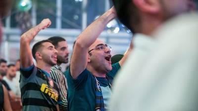 Football fans of Man City and Inter Milan watching the game at Barasti Beach in Dubai. Ruel Pableo for The National