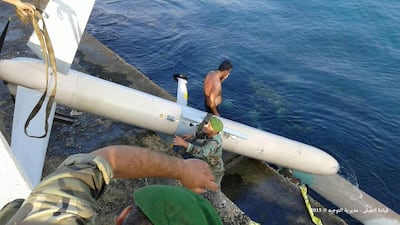 Lebanese soldiers pull out what they say is an Israeli surveillance drone from waters near the northern port city of Tripoli, in this picture released by the Lebanese army on July 11, 2015. Lebanese army website/Handout via Reuters