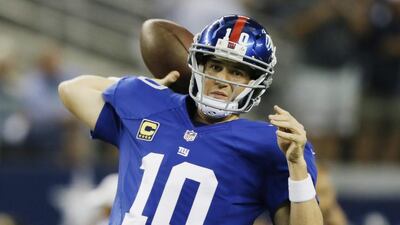 Eli Manning threw for 200 yards and a touchdown in a win over the Vikings on Monday night. Tony Gutierrez / AP