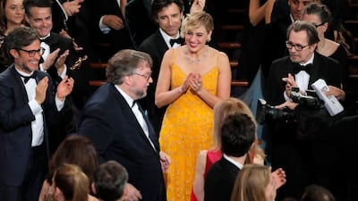 Guillermo del Toro walks to the stage to accept the Oscar for Best Picture for 'The Shape of Water.' Lucas Jackson / Reuters