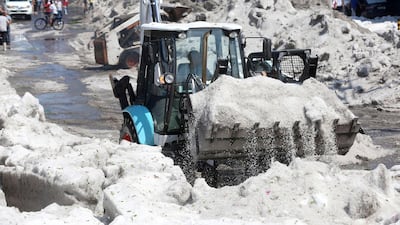 A truck carries ice as it cleans the street after a heavy storm of rain and hail which affected Guadalajara, Mexico. Reuters
