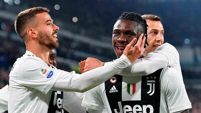 Moise Kean, centre, celebrates with teammates after scoring at the Allianz Stadium in Turin. ANSA via AP