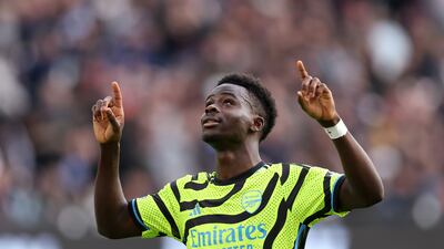 Arsenal's Bukayo Saka celebrates scoring his team's second goal from the penalty spot. Getty Images