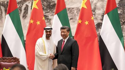 Sheikh Mohamed bin Zayed, Crown Prince of Abu Dhabi and Deputy Supreme Commander of the Armed Forces (L) and Xi Jinping, President of China (R), stand for a photograph after signing an agreement at the Great Hall of the People in Beijing, China on July 22, 2019. Mohamed Al Hammadi / Ministry of Presidential Affairs
