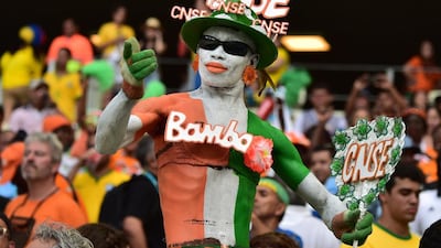 Ivory Coast fans cheer before their Group C match against Greece on Tuesday at the 2014 World Cup in Fortaleza, Brazil. Gabriel Bouys / AFP