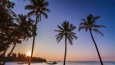 Guests at One & Only Reethi Rah can relax in a hammock and gaze out into the blue-green waters of the ocean. Coutesy One&Only Reethi Rah