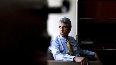 Tom Pennella of CH2M Hill says employees are given annual training on how to use the Little Yellow Book. Christopher Pike / The National