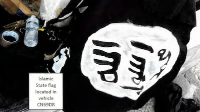 One of two home-made painted ISIS flags found in the vehicle used by Sajid and Naveed Akram in Sydney. PA