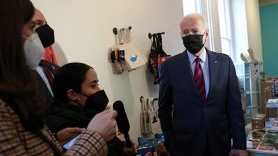 US President Joe Biden talks about the Russia-Ukraine crisis at a small clothing and gifts store on Capitol Hill in Washington on, January 25. Reuters