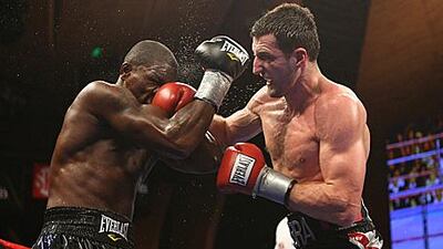 Carl Froch lands a right on Jermain Taylor during their WBC Super Middleweight Championship bout at the MGM Grand.