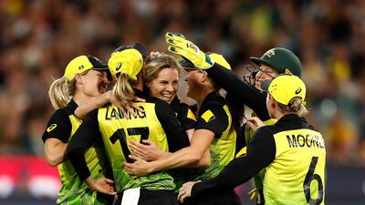 Australia's Sophie Molineux celebrates after taking the wicket of Smriti Mandhana of India. Getty