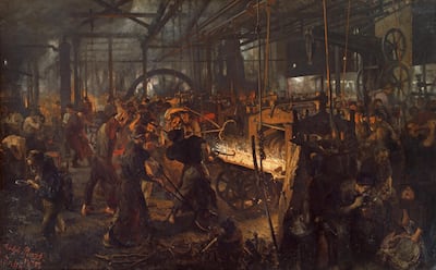 The Iron Rolling Mill painting is found in the collection of the Staatliche Museen, Berlin – one of the many images depicting the Industrial Revolution. Getty Images
