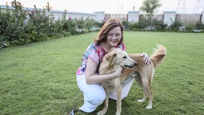 Evelyn Priess with Charlie, her rescued Saluki. Sarah Dea/The National