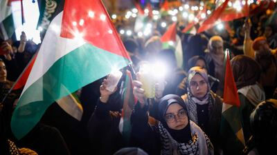 Demonstrators in Istanbul wave Palestinian flags as they take part in a rally in solidarity with Palestinians. AFP