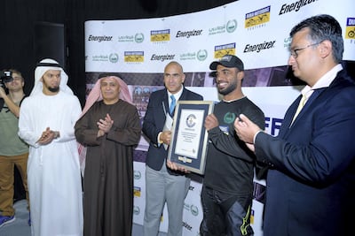 Captain Abdulla Hattawi, a member of the Dubai Police Force, Dubai Police Stunt Team and one of the top ATV stunt athletes in the world set the new record. Courtesy of Dubai Police.