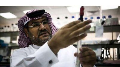 Dr Schamuddin Galadari examines cells at Al Ain Medical School.