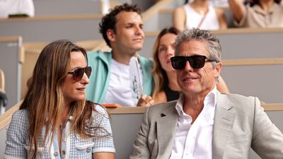 Actor Hugh Grant was in the stands as Novak Djokovic won the French Open title on Sunday. Getty