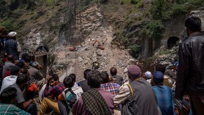 Aamir Ali, an official at the government’s disaster management department, said three workers trapped at the entrance of the tunnel were rescued.