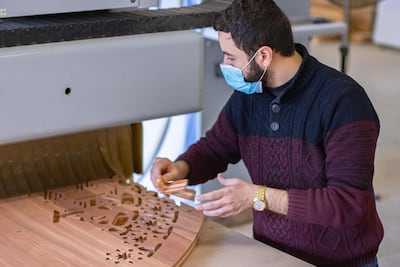 Minjara's Ali Boksmati working on moucharabiya panels at the Minjara workshop. Photo: Ahmad Zaatiti