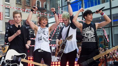 5 Seconds of Summer band members, from left, Luke Hemmings, Ashton Irwin, Michael Clifford and Calum Hood. Charles Sykes/ Invision / AP Photo