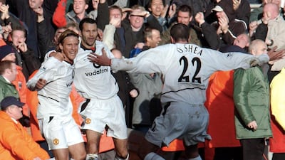 Diego Forlan con Ryan Giggs y John O'Shea a Manchester United en 2002. Paul Barker / AFP / 1 Diciembre, 2002