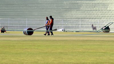 Ground staff prepare the pitch in Rawalpindi. EPA