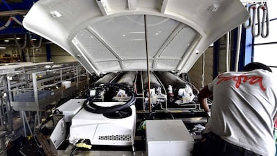A technician works on the hydrogen tank of an under construction hydrogen bus in southwestern France. Hydrogen, an alternative fuel has risen in prominence in several markets around the world. AFP