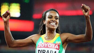 Genzebe Dibaba of Ethiopia celebrates after winning the women's 1500m final during the 2015 Athletics World Championships in Beijing on Tuesday. Srdjan Suki / EPA / August 25, 2015
