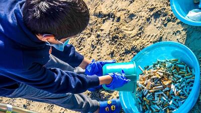 Some 400,000 cigarette butts were cleared over 1,100 hours from 17 different beaches in Dubai. Courtesy Dubai Municipality