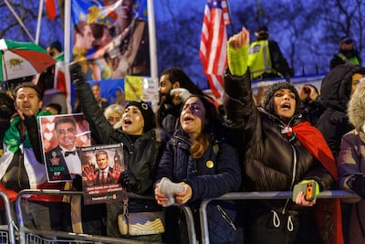 Protesters outside the Iranian Embassy in Knightsbridge, west London. Getty Images