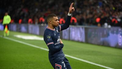 Kylian Mbappe celebrates after scoring for PSG against Lorient. AFP