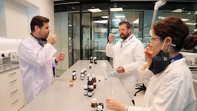 (L-R) Thiago Jimenez, David Patrick and Taraneh Taghaddossi at work in the lab.