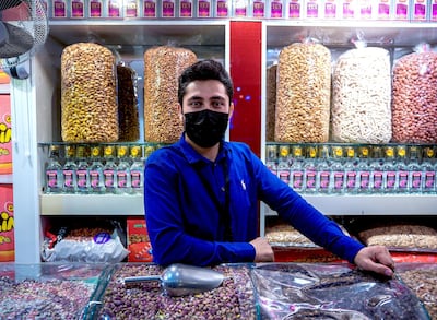 Kalim, a nut vendor at the Afghanistan market at Sheikh Zayed Heritage Festival. Victor Besa / The National