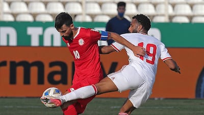 Lebanon midfielder Mohamad Haidar under pressure from UAE midfielder Tahnoon Al Zaabi. AFP