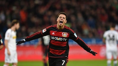 Bayer Leverkusen's Javier Hernandez celebrates after scoring in their Bundesliga win over Borussia Monchengladbach on Saturday. Patrik Stollarz / AFP / December 12, 2015