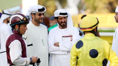 Trainer Ali Rashid Al Raihe, right, before the S I S UK race.