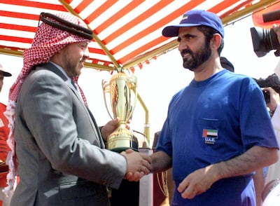 Sheikh Mohammed bin Rashid, then Crown Prince of Dubai and Minister of Defence, meets with King Abdullah II of Jordan at the Bahrain Endurance Ride in April 2000. Photo by AFP