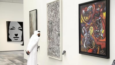 A visitor at the modern and contemporary section of Louvre Abu Dhabi, from November 2017. Chris Whiteoak / The National