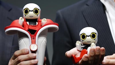 The ¥39,800 doll-like Kirobo Mini supposedly has the smarts of a 5-year-old. Shizuo Kambayashi / AP Photo