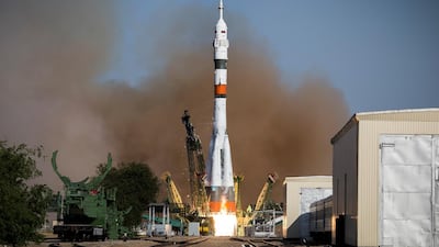 Fast and furious: The record for the shortest trip to the International Space Station is held by an unmanned cargo Russian Progress 70 cargo ship in July last year, arriving in just under three hours and 40 minutes. Pictured is Progress 73 cargo launching on August 22, 2019. Roscosmos Space Agency Press Service photo via AP