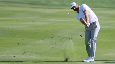 Dustin Johnson of the United States plays a shot on the eighth hole during practice rounds for the Abu Dhabi HSBC Championship at Abu Dhabi Golf Club. Matthew Lewis / Getty Images