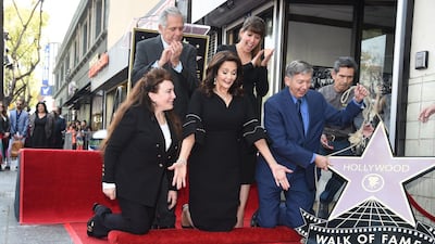 Lynda Carter, centre, reacts as her star is unveiled on the Hollywood Walk of Fame. From left: Donelle Dadigan, Leslie Moonves, Lynda Carter, Patty Jenkins and Leron Gubler. Robyn Beck / AFP