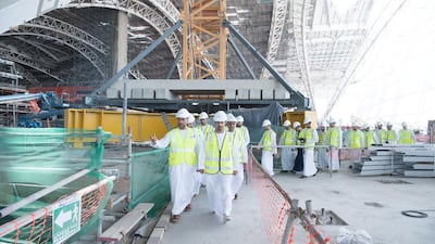 Sheikh Hazza bin Zayed, deputy chairman of the Abu Dhabi Executive Council, tours the Midfield Terminal Building at Abu Dhabi International Airport on Sunday. The terminal will stretch over about 742,000 square metres. Wam