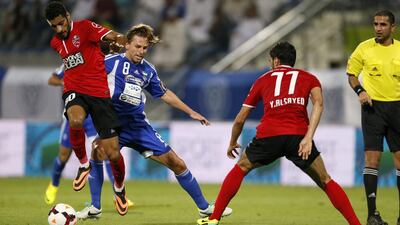 Brett Holman, centre, and his Al Nasr teammates found themselves trailing Al Ahli at the sound of the whistle. Antonie Robertson / The National