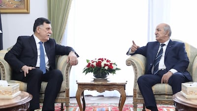 Libya's Faiez Serraj (L) arrived in Algeria for talks with President Abdelaziz Tebboune on Monday. AFP